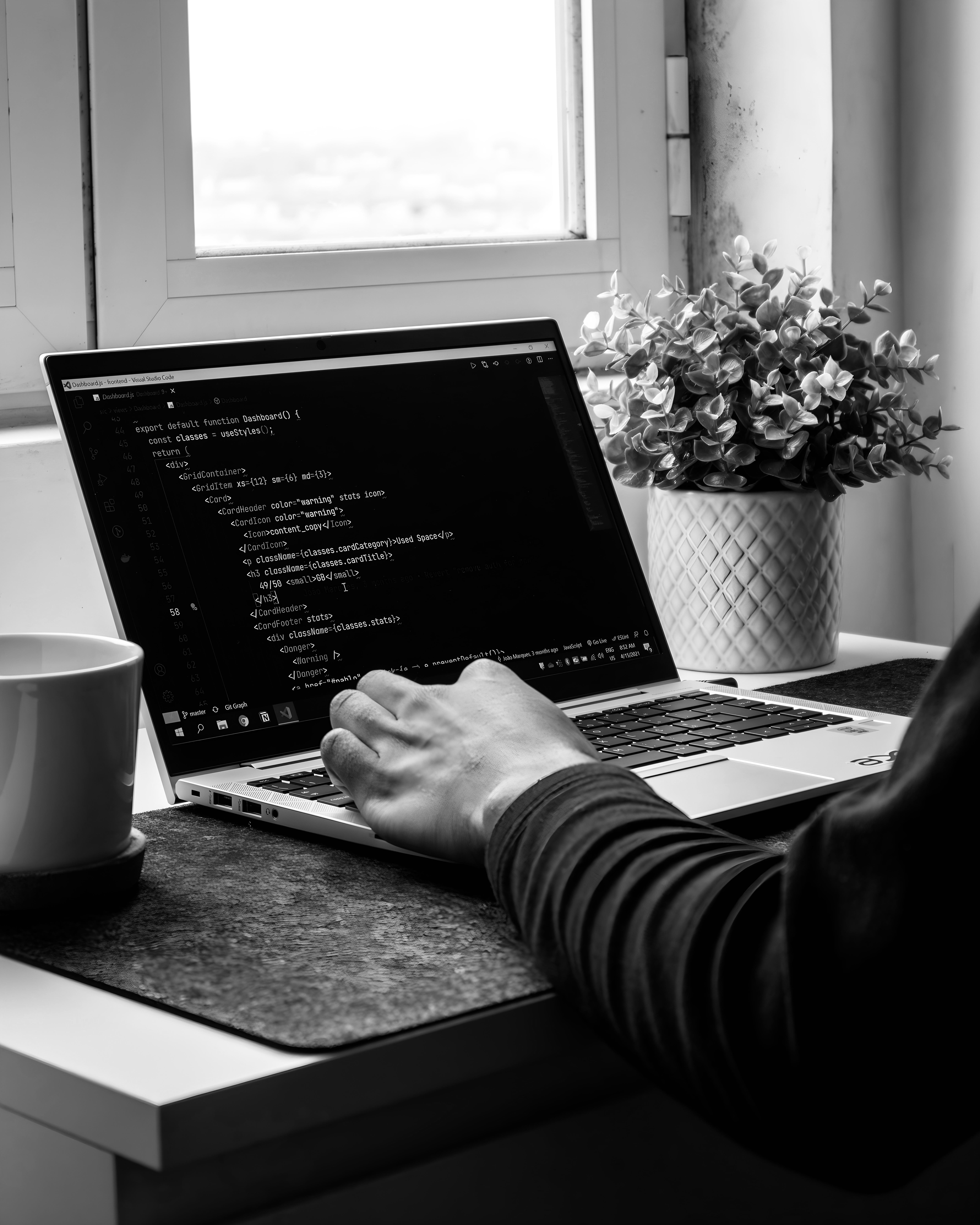 A laptop screen showing lines of code